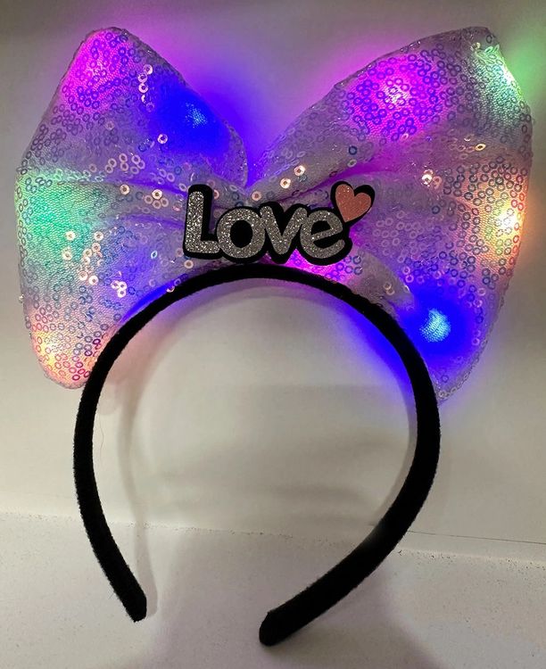 Diğer MEYSMRSMR-D141-LİLA-BLMY Mey İthalat Led Işıklı 3 Farklı Fonksiyonda Yanan Gümüş Love Yazılı Lila Fiyonk Taç 20X17 Cm